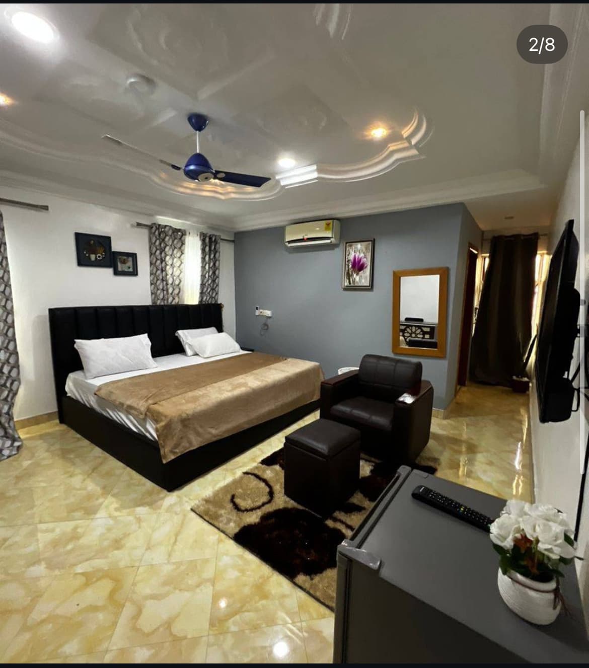 Deluxe Modern Room with Yellow Accent Wall